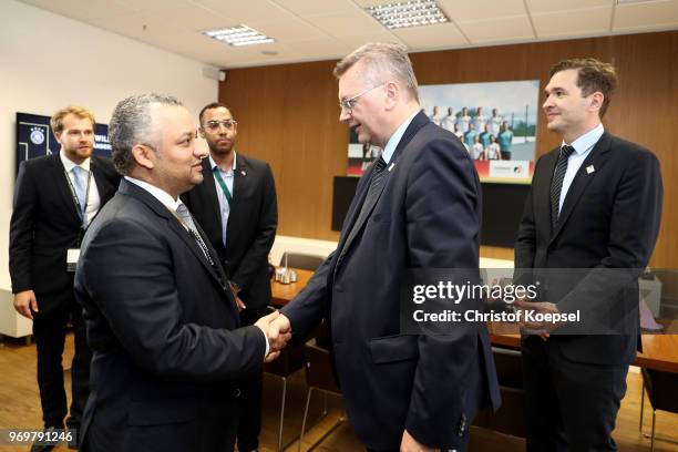 Reinhard Grindel, DFB president welcomes Adel Ezzat, president of the Saudi Arabia Football Federation prior to the International friendly match...