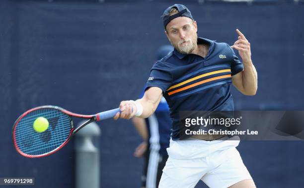 Denis Kudla of USA in action against Jeremy Chardy of France during their Quarter Final match on Day 7 of the Fuzion 100 Surbition Trophy on June 8,...