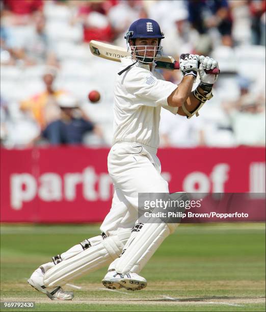 England captain Michael Vaughan hits out on his way to 101 not out, his second century of the match in the 1st Test match between England and West...