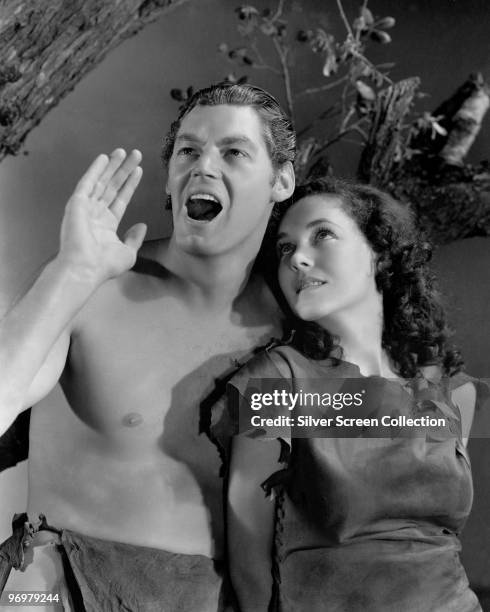 Johnny Weissmuller as Tarzan and Maureen O'Sullivan as Jane Parker in a publicity still for the film 'Tarzan Escapes', 1936.