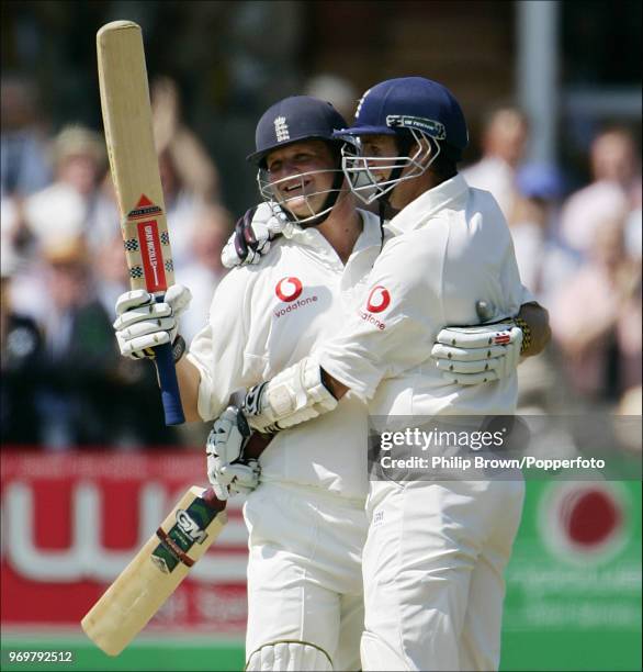 England batsman Robert Key is congratulated on reaching his double century during his innings of 221 by England captain Michael Vaughan in the 1st...