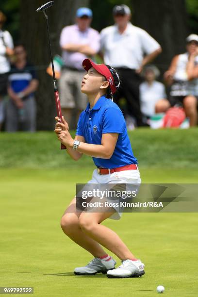 Lucy Li of the United States reacts after missing a putt on the 17th green during four-ball matches on day one of the 2018 Curtis Cup at Quaker Ridge...