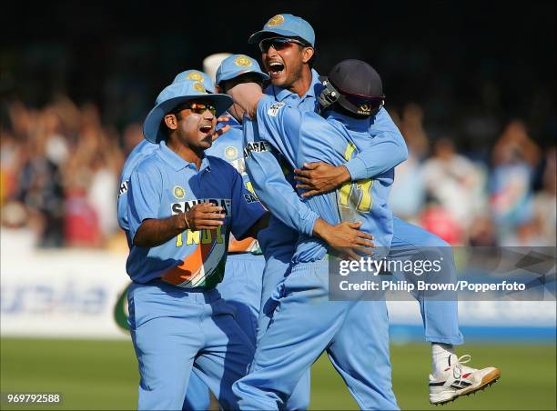 India's captain Sourav Ganguly celebrates with teammate Mohammad Kaif after the runout of England's Paul Collingwood during the 3rd Natwest Challenge...