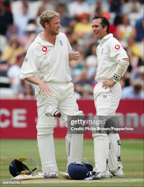 England batsmen Andrew Flintoff and Michael Vaughan take a break during their 92-run partnership in the 1st Test match between England and West...