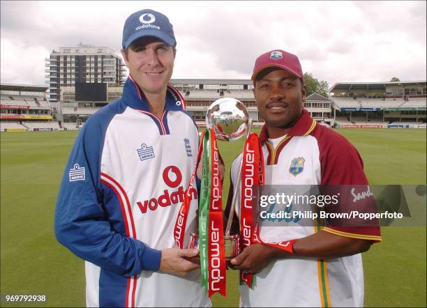 Team captains Michael Vaughan of England and Brian Lara of West Indies with the trophy before the start of the four-match Test series between England...