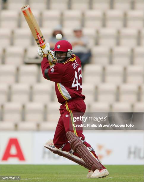 West Indies batsman Chris Gayle hits out during his innings of 99 runs in the ICC Champions Trophy match between Bangladesh and West Indies at The...
