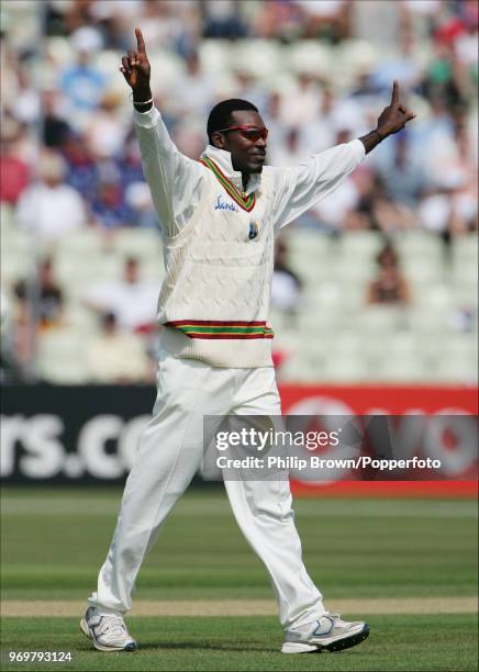 Chris Gayle of West indies celebrates one of his five 2nd-innings wickets during the 2nd Test match between England and West Indies at Edgbaston,...