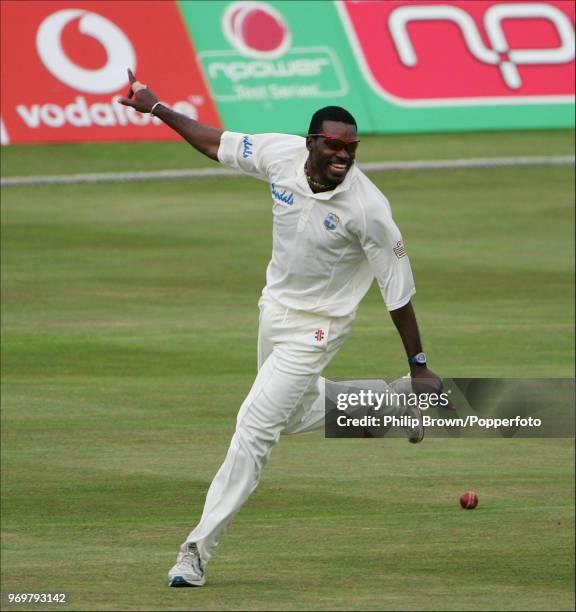 Chris Gayle of West Indies celebrates catching Michael Vaughan of England for 3 runs during the 2nd Test match between England and West Indies at...