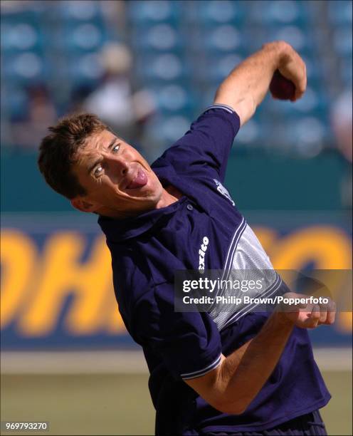 Brad Hogg of Warwickshire and Australia warms up with some bowling practice before the Frizzell County Championship match between Warwickshire and...