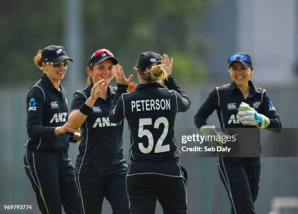 Dublin , Ireland - 8 June 2018; Amelia Kerr of New Zealand, second left, is congratulated by team-mates after catching Mary Waldron of Ireland in the...