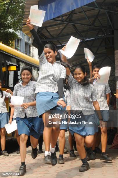 Olkata, India Students of National High School rejoice after West Bengal Council of Higher Secondary Education declared class 12th examination result...