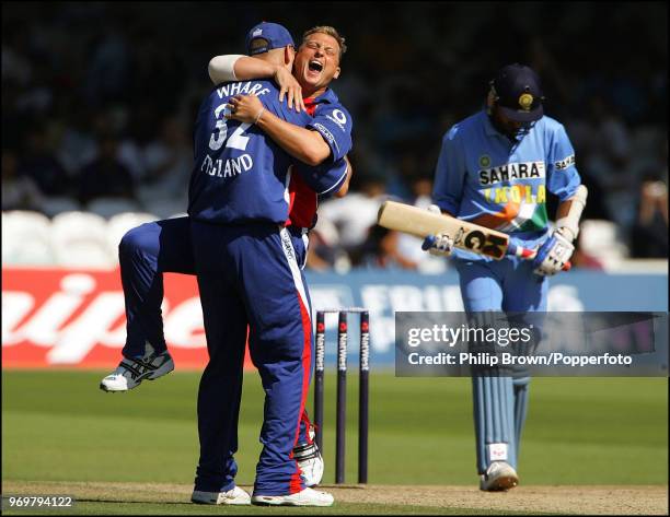 Darren Gough of England celebrates with teammate Alex Wharf after getting his 200th ODI wicket, Harbhajan Singh of India caught by England captain...