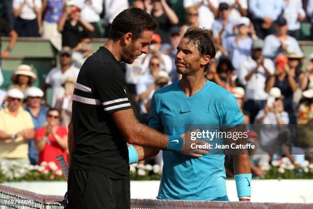 Rafael Nadal of Spain greets Juan Martin Del Potro of Argentina after beating him in semi-final during Day 13 of the 2018 French Open at Roland...