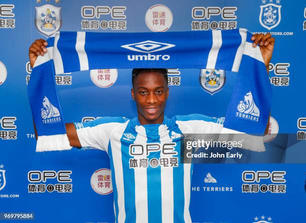 New signing Terence Kongolo joins Huddersfield Town from AC Monaco and launches the new Umbro home kit on June 8, 2018 in Huddersfield, England.