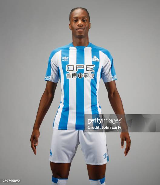 New signing Terence Kongolo joins Huddersfield Town from AC Monaco and launches the new Umbro home kit on June 8, 2018 in Huddersfield, England.