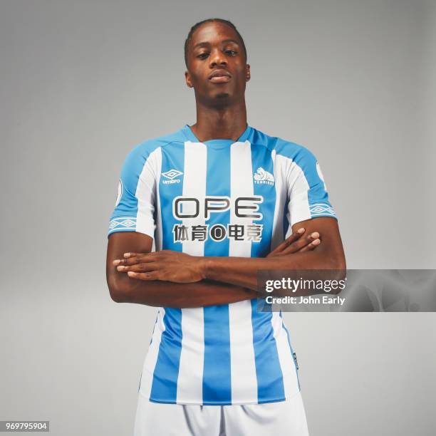 New signing Terence Kongolo joins Huddersfield Town from AC Monaco and launches the new Umbro home kit on June 8, 2018 in Huddersfield, England.