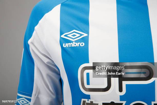 New signing Terence Kongolo joins Huddersfield Town from AC Monaco and launches the new Umbro home kit on June 8, 2018 in Huddersfield, England.