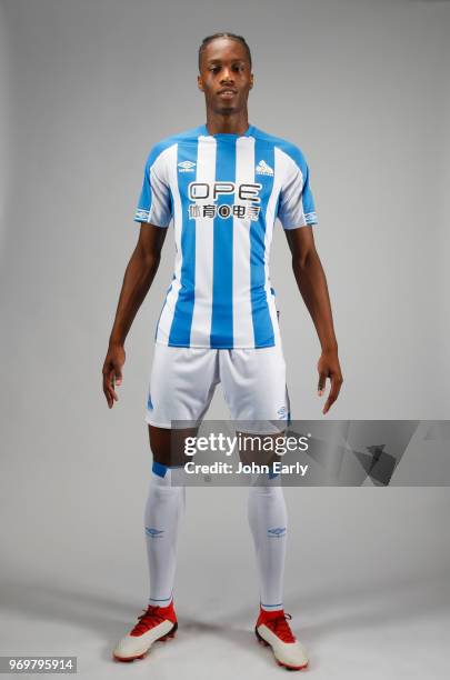 New signing Terence Kongolo joins Huddersfield Town from AC Monaco and launches the new Umbro home kit on June 8, 2018 in Huddersfield, England.