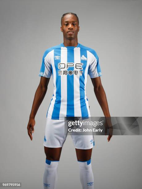 New signing Terence Kongolo joins Huddersfield Town from AC Monaco and launches the new Umbro home kit on June 8, 2018 in Huddersfield, England.