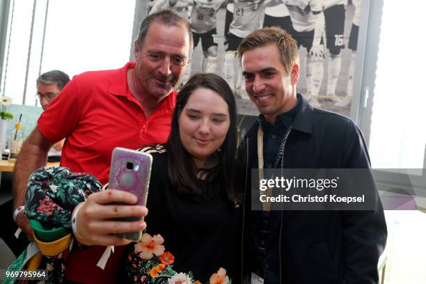 Sophie Bein , Uwe Bein and Philipp Lahm do a selfie during the Club Of Former National Players Meeting at BayArena on June 8, 2018 in Leverkusen,...