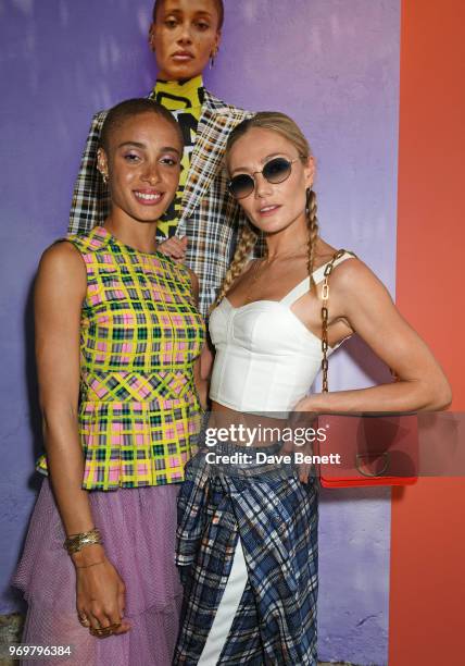 Adwoa Aboah and Clara Paget attend the Burberry x Adwoa cocktail party at Thomas's on June 8, 2018 in London, Englan