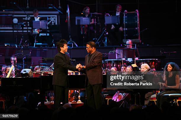 Herbie Hancock and Lang Lang perform at the Royal Albert Hall on July 11, 2009 in London, England.