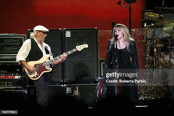John McVie and Stevie Nicks of Fleetwood Mac perform on stage at Wembley Arena on October 30th 2009 in London.