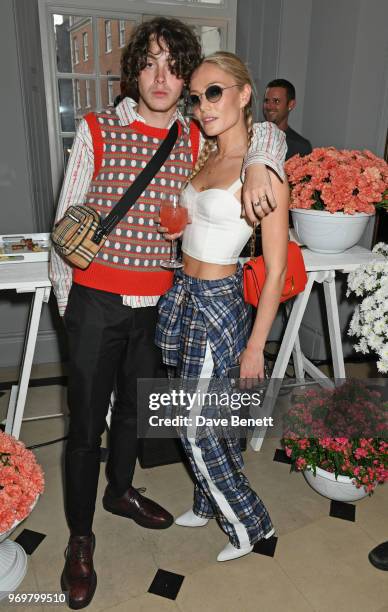 Sonny Hall and Clara Paget attend the Burberry x Adwoa cocktail party at Thomas's on June 8, 2018 in London, Englan