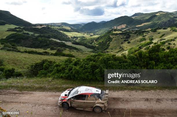 Finnish driver Jari-Matti Latvala and Finnish co-driver Miikka Anttila drive their Toyota Yaris WR, during the second day of the 2018 FIA World Rally...