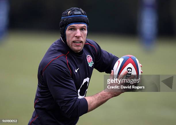 James Haskell passes the ball during the England training session held at Pennyhill Park on February 23, 2010 in Bagshot, England.