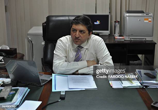 Pakistan Board of Investment chairman Saleem H Mandviwalla holds an interview with an AFP journalist at his office in Islamabad on February 23, 2010....