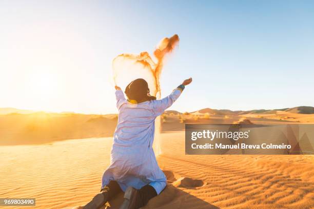 the desert master - djellaba stock pictures, royalty-free photos & images