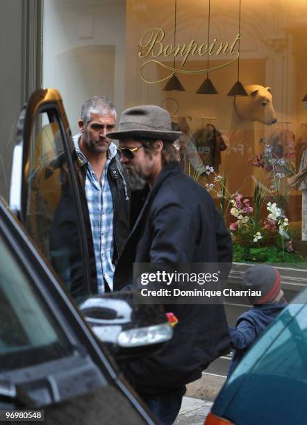 Brad Pitt is seen with daughter Shiloh Jolie-Pitt while shopping at Bonpoint shop in Paris on February 23, 2010 in Paris, France.