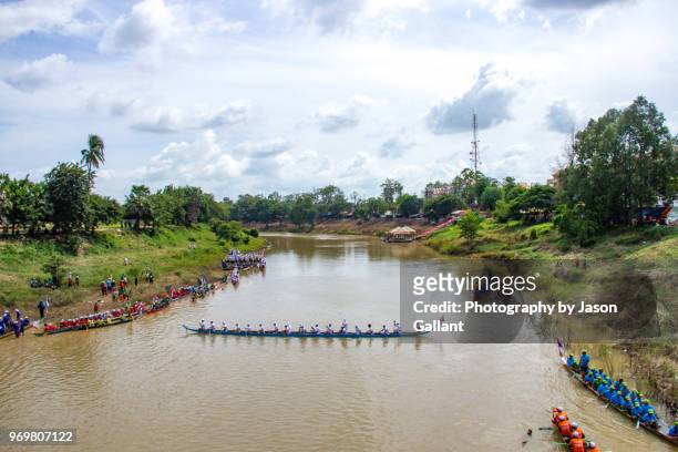 boats getting ready to race at the boat races in battambang - cambodia water festival stock pictures, royalty-free photos & images
