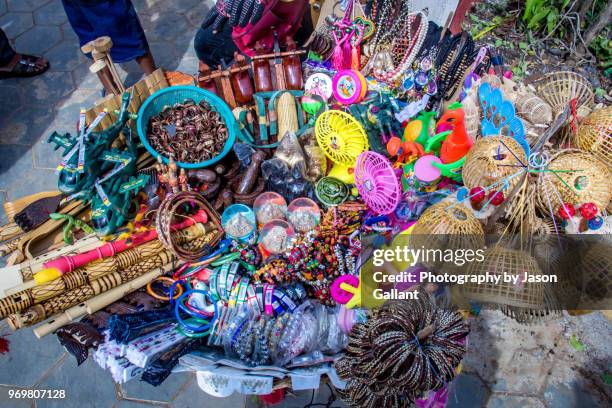 toys and trinkets for sale at the water festival in battambang, cambodia. - cambodia water festival stock pictures, royalty-free photos & images