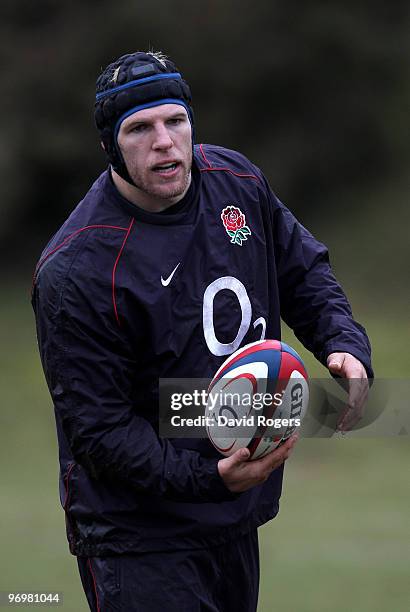 James Haskell holds onto the ball during the England training session held at Pennyhill Park on February 23, 2010 in Bagshot, England.