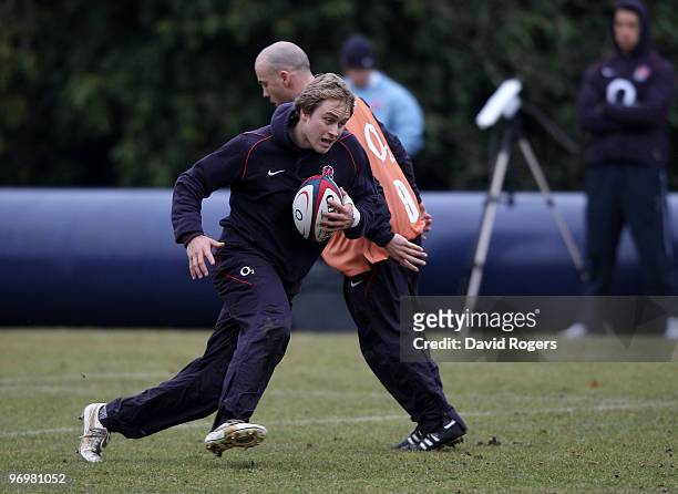 Mathew Tait runs with the ball during the England training session held at Pennyhill Park on February 23, 2010 in Bagshot, England.