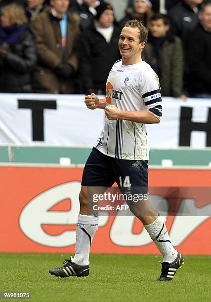 Bolton Wanderers' English forward Kevin Davies celebrates after scoring the opening goal during the FA Cup Fifth round football match against...