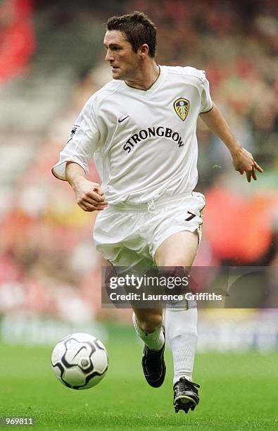 Robbie Keane of Leeds United runs with the ball during the FA Barclaycard Premiership match against Liverpool played at Anfield, in Liverpool,...