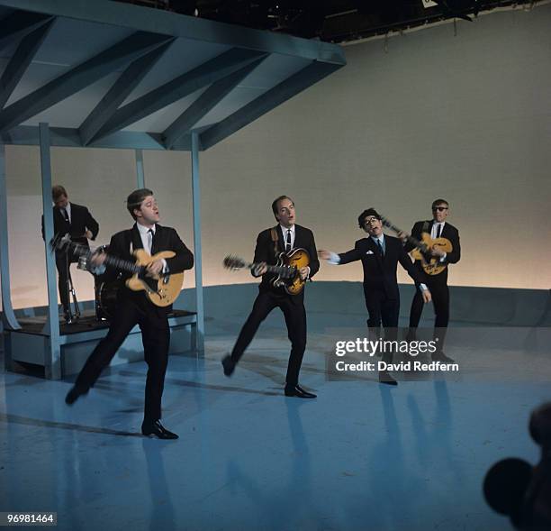 Bernie Dwyer, Pete Birrell, Roy Crewdson, Freddie Garrity and Derek Quinn of Freddie and the Dreamers perform on a television show in 1964.