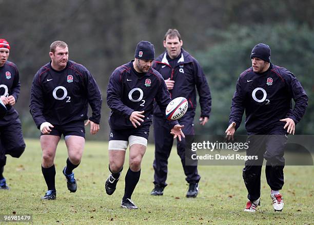 Nick Easter passes the ball during the England training session held at Pennyhill Park on February 23, 2010 in Bagshot, England.