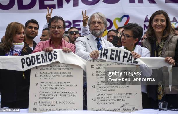 Colombian presidential candidate Gustavo Petro for the Colombia Humana Party and his vice-presidential running-mate Angela Maria Robledo attend the...