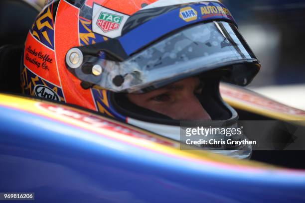 Alexander Rossi, driver of the NAPA Auto Parts Honda, sits in his car during practice for the Verizon IndyCar Series DXC Technology 600 at Texas...