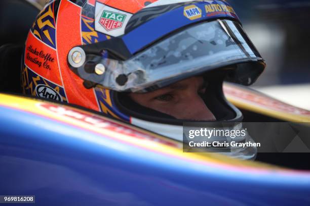 Alexander Rossi, driver of the NAPA Auto Parts Honda, sits in his car during practice for the Verizon IndyCar Series DXC Technology 600 at Texas...