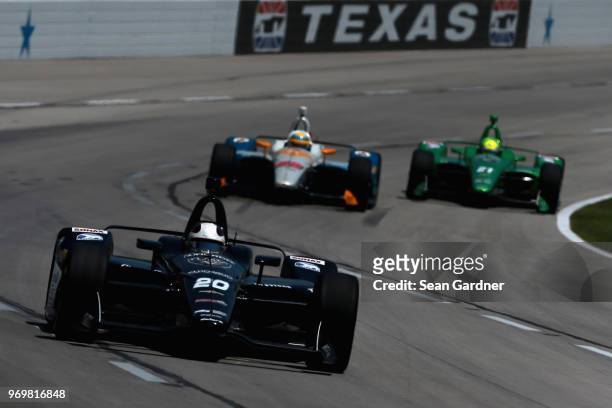 Ed Carpenter, driver of the Ed Carpenter Racing Fuzzy's Vodka Chevrdolet, drives during practie for the Verizon IndyCar Series DXC Technology 600 at...