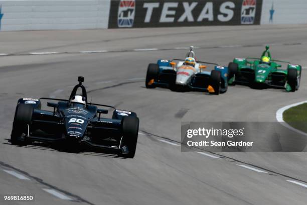 Ed Carpenter, driver of the Ed Carpenter Racing Fuzzy's Vodka Chevrdolet, drives during practie for the Verizon IndyCar Series DXC Technology 600 at...