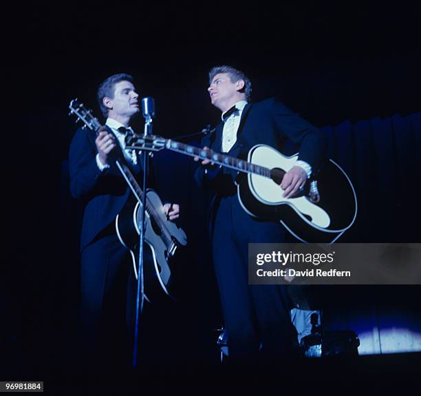 Don and Phil of the Everly Brothers performs on stage circa 1965.