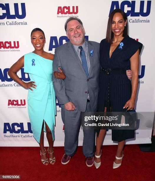 Actresses Samira Wiley and Amanda Brugel pose with executive producer Bruce Miller at the ACLU SoCal Annual Luncheon at JW Marriott Los Angeles at...