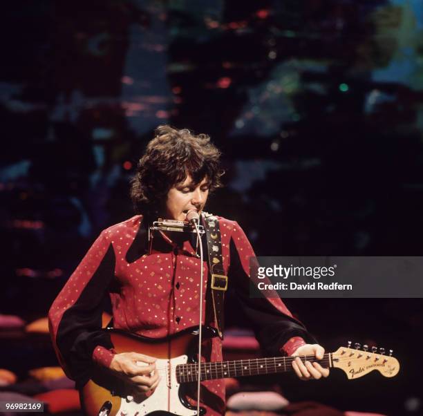 Scottish singer and musician Donovan plays a Fender Stratocaster guitar on a BBC television show in London in August 1972.