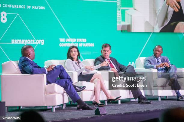 Steve Benjamin, mayor of Columbia, South Carolina, from left, Facebook COO Sheryl Sandberg, Marty Walsh, mayor of Boston and Sylvester Turner, mayor...